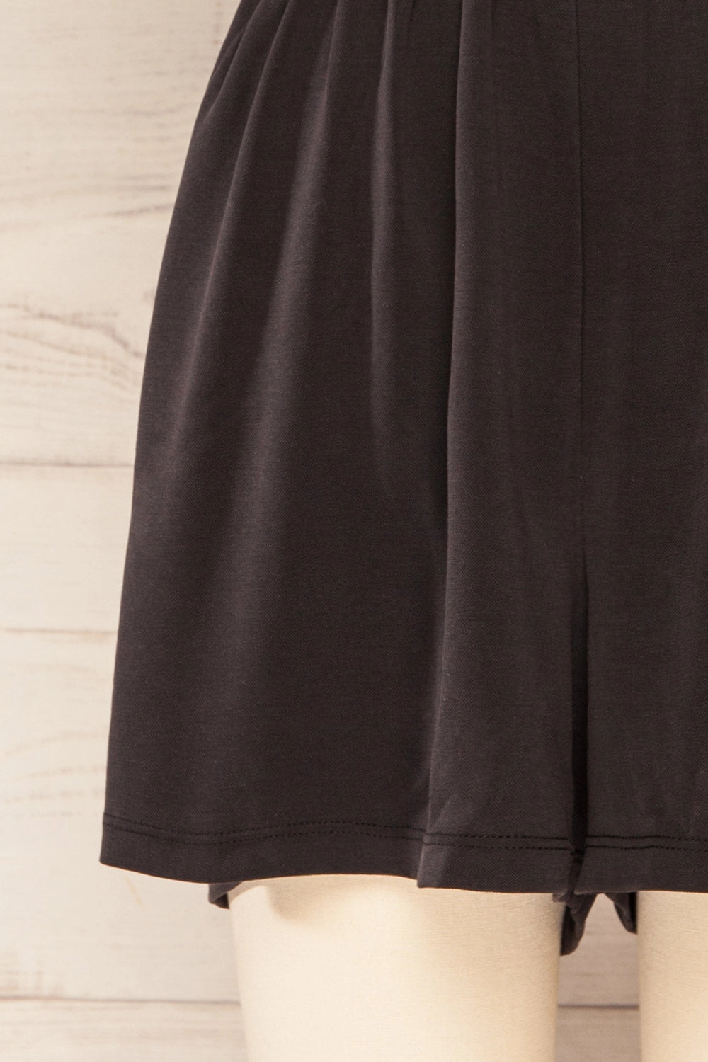 Opoczno Black | Sleeveless Plunging Neckline Romper